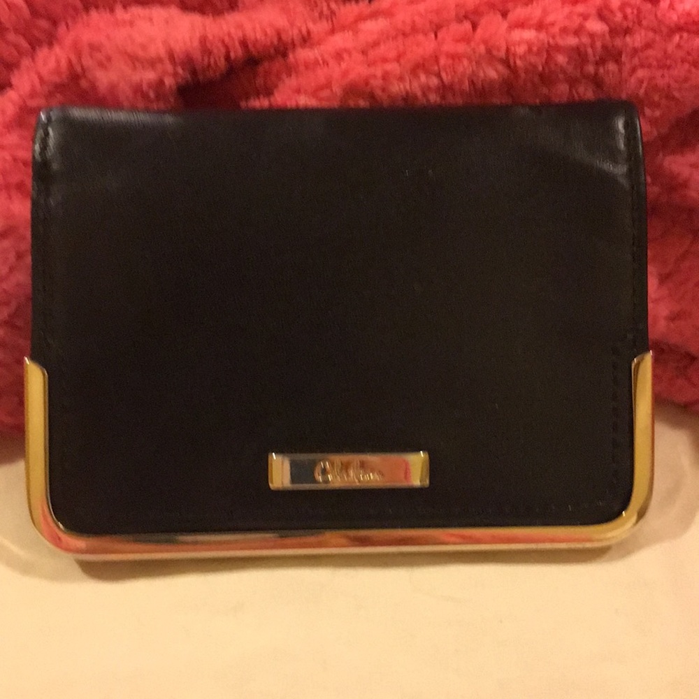 Cole Haan black wallet.
